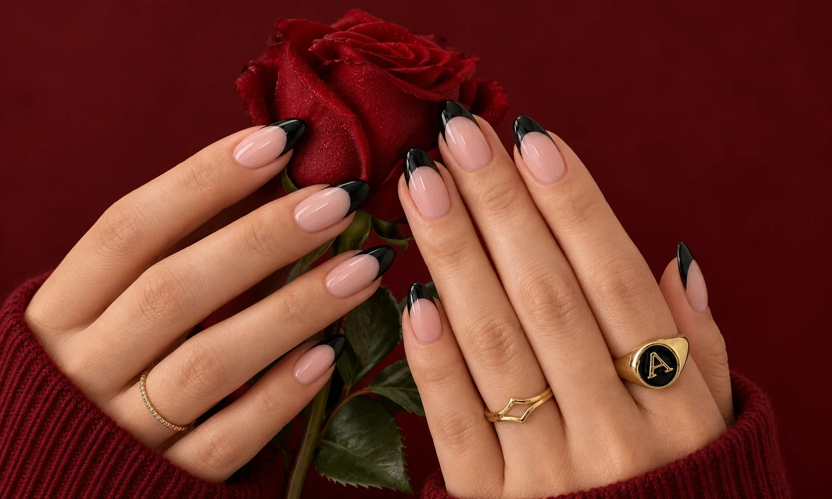 Almond nails with glossy black tips.