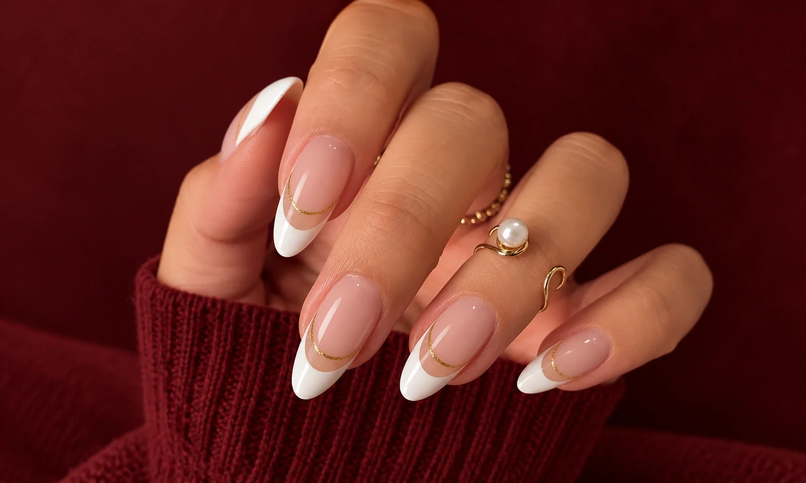Classic white almond French tip nails.