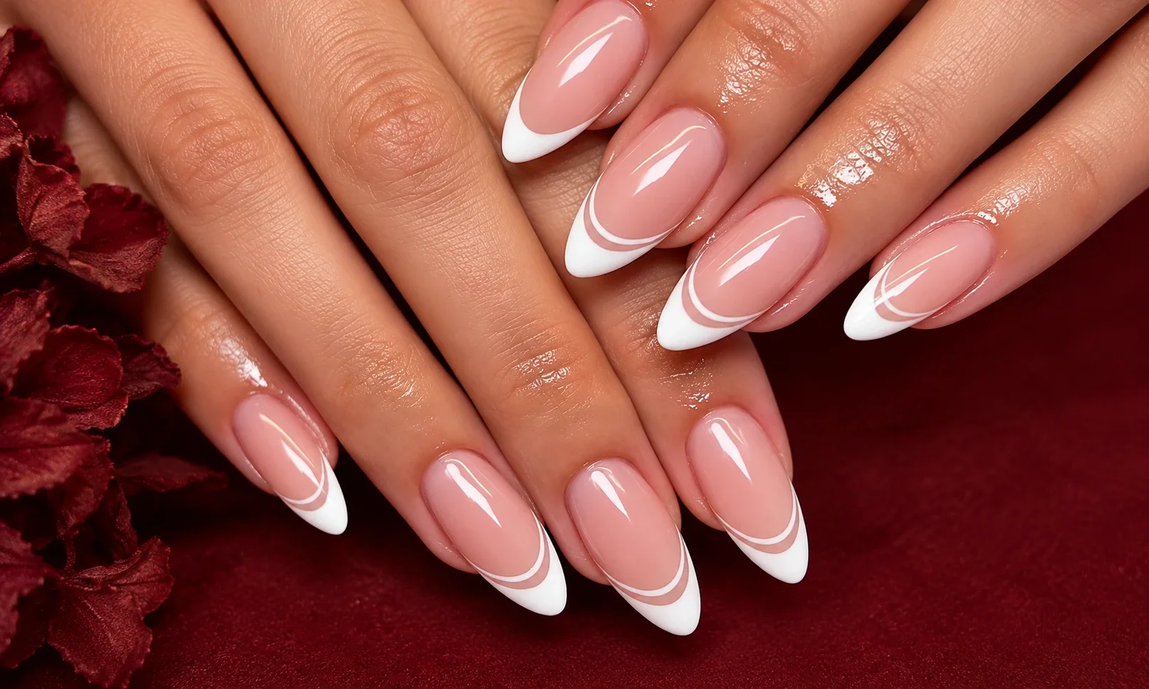 White French tips with gold accent lines.