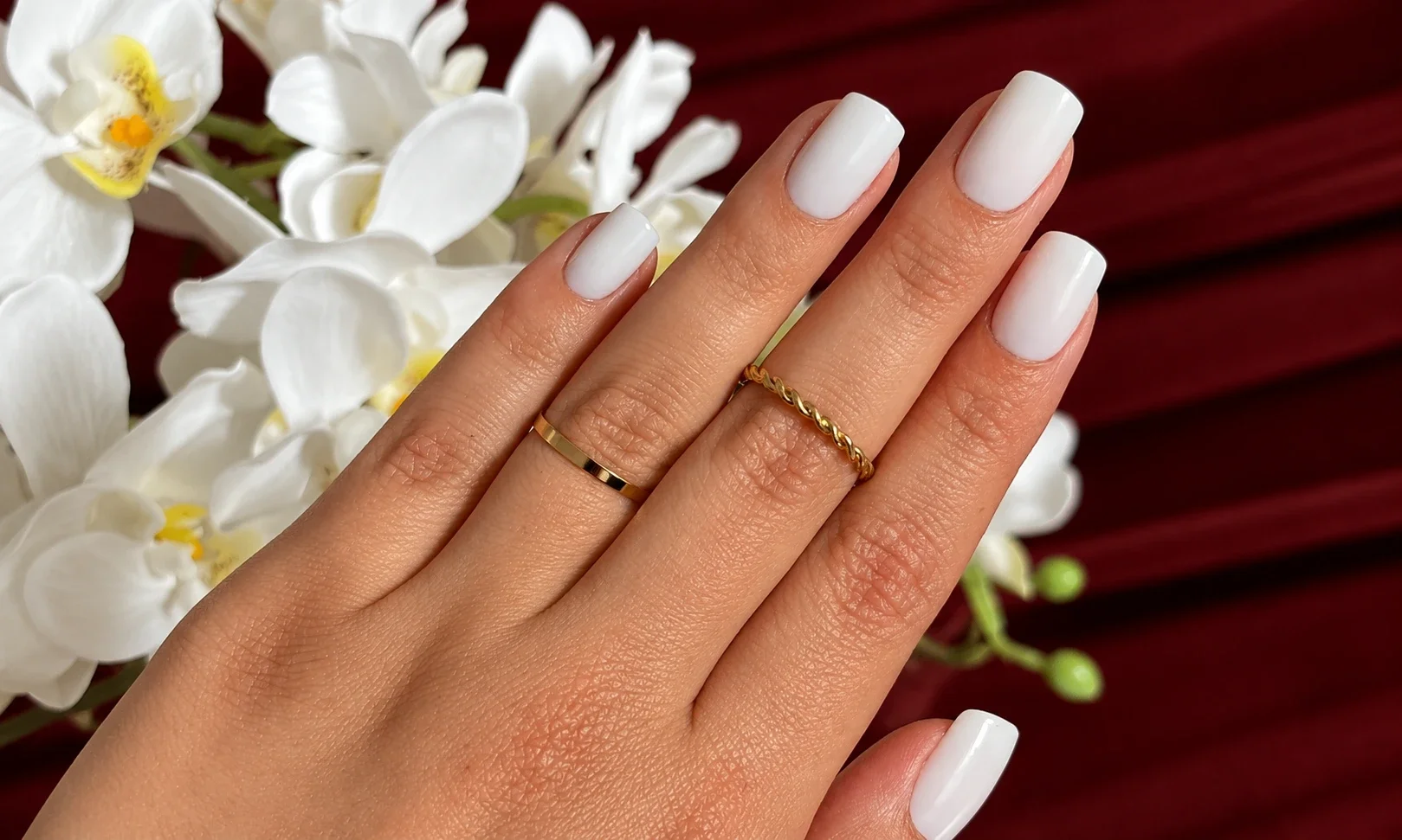 Glossy milky white nail manicure