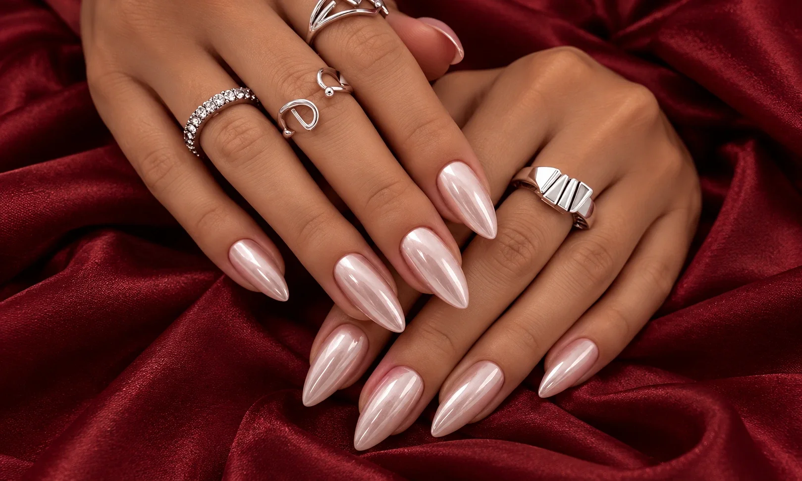 Reflective pale pink chrome nails