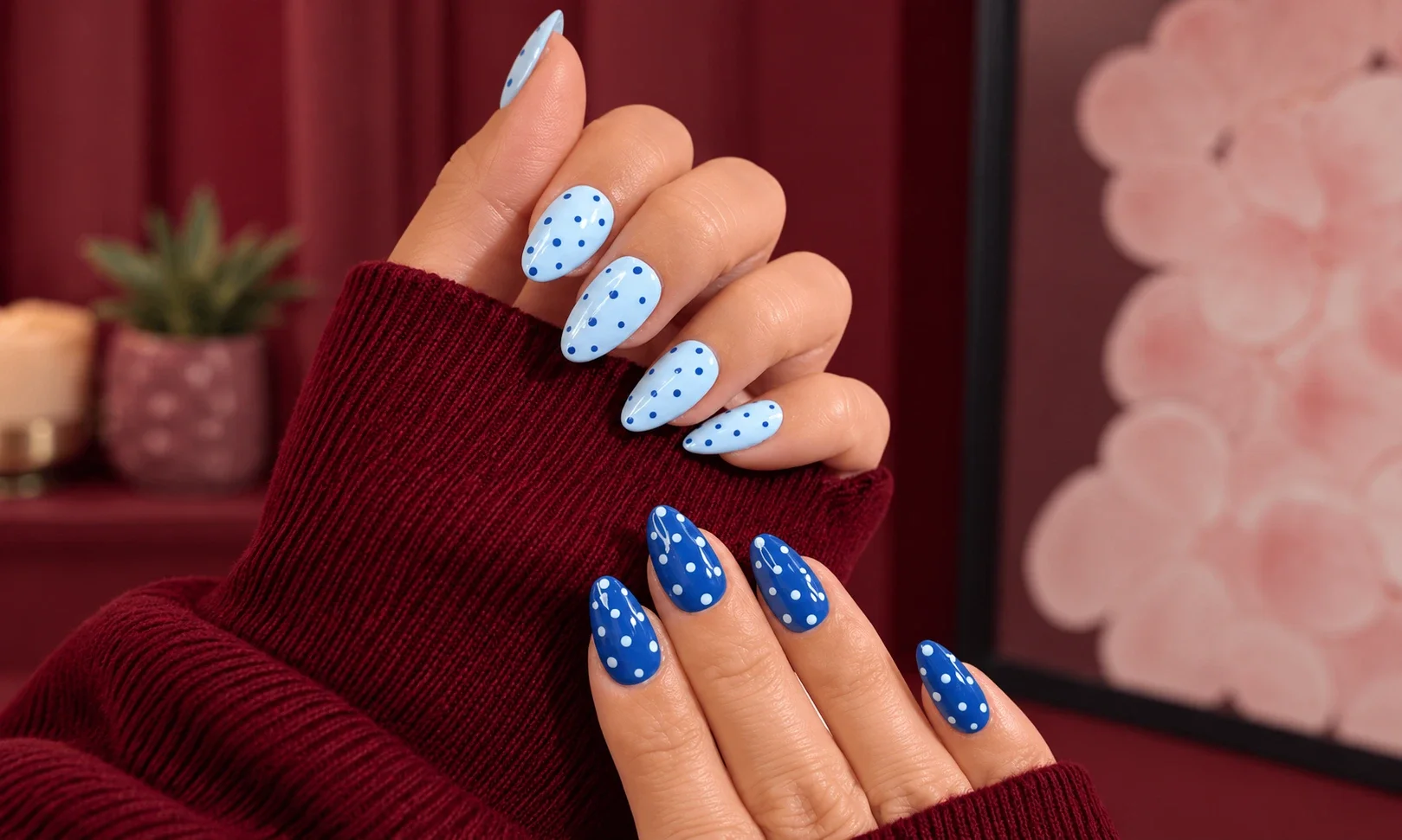 Pink nails with tiny black polka dots
