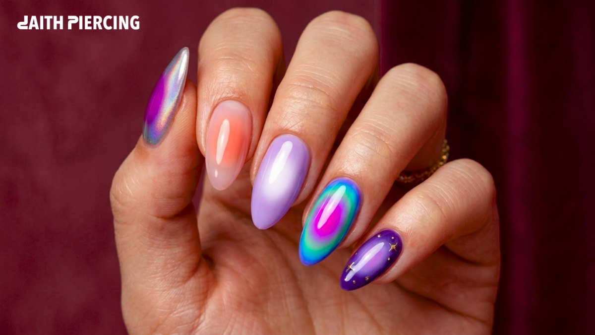 A fresh modern aura manicure displaying vibrant neon color blends and celestial star details with the Daith Piercing brand logo